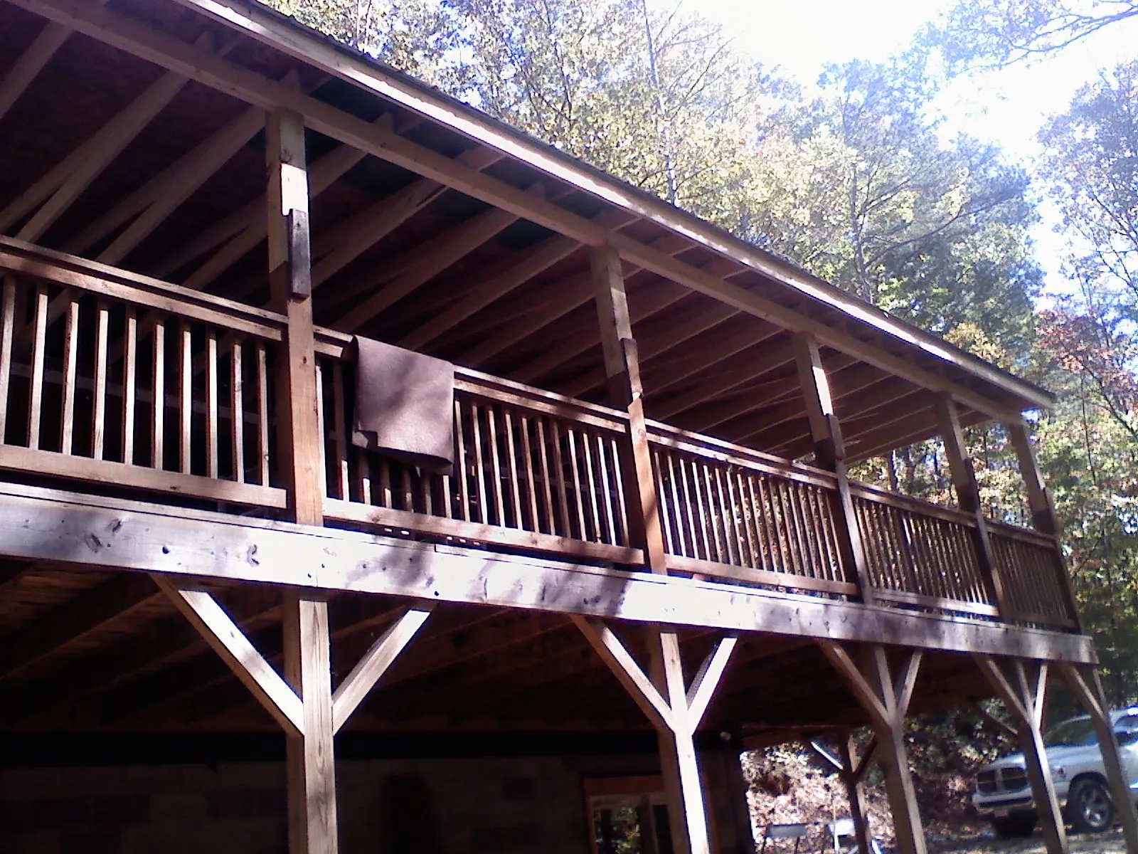 Timber framing under a new elevated porch and deck — Roof Leak Repair in Tualatin by Roofing Brothers